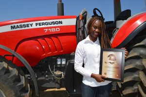 Sue Chuzu, Marketing and Communications Manager, AGCO Zambia receives the Award for long standing Brand